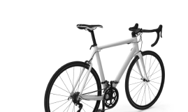 A white racing bike in front of a white background.